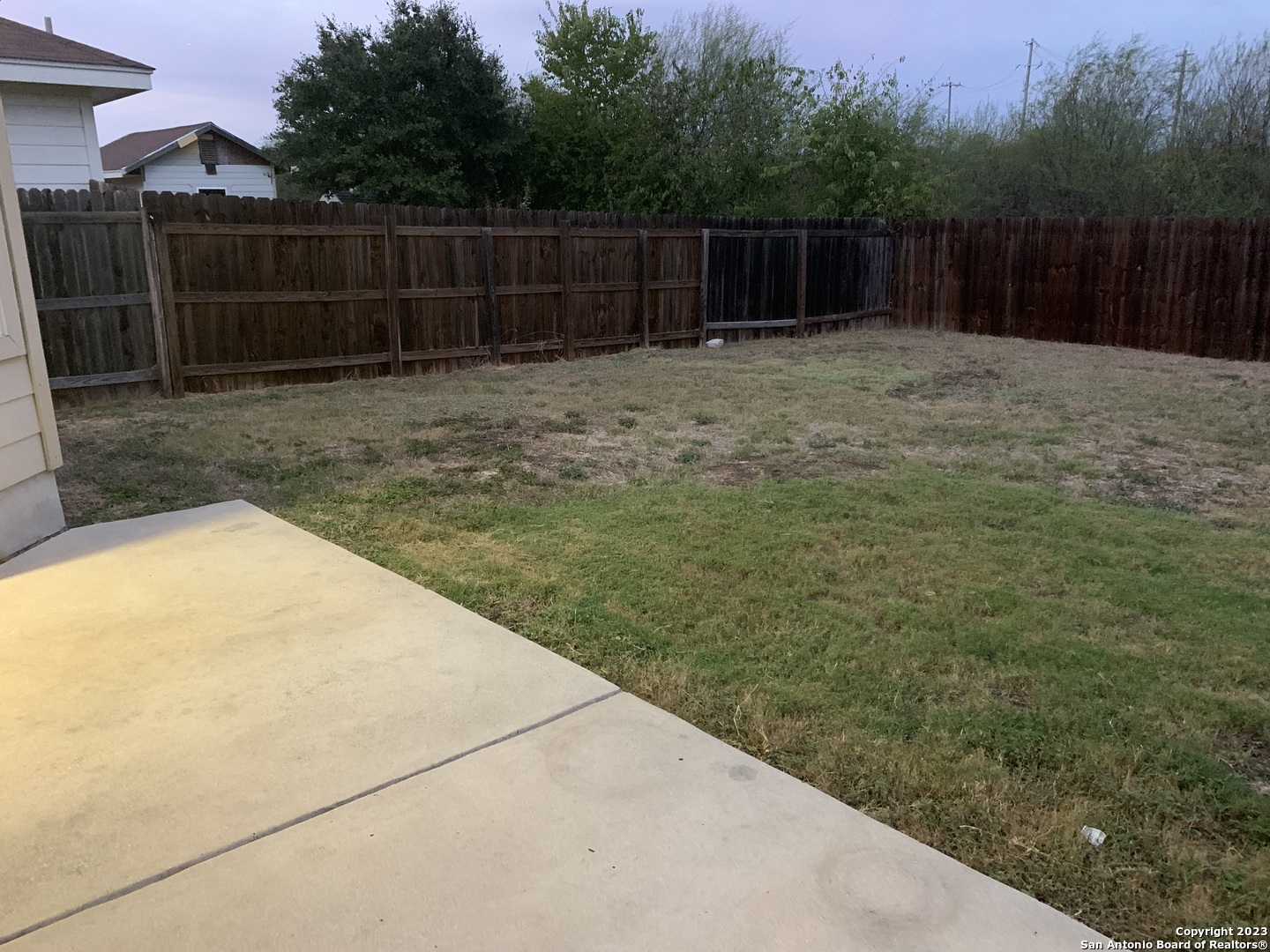 4618 Everett Loop Converse, TX 78109 - Photo 20 of 20 a view of a backyard with wooden fence
