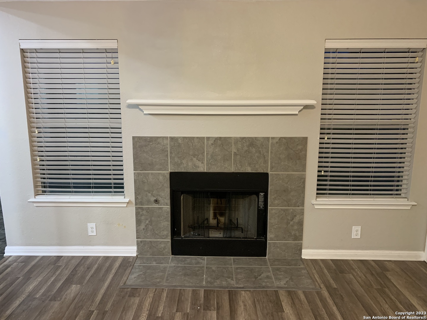 4618 Everett Loop Converse, TX 78109 - Photo 8 of 20 a view of a livingroom with a fireplace and window