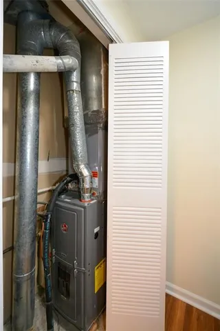 a view of a house with swimming pool and sitting area