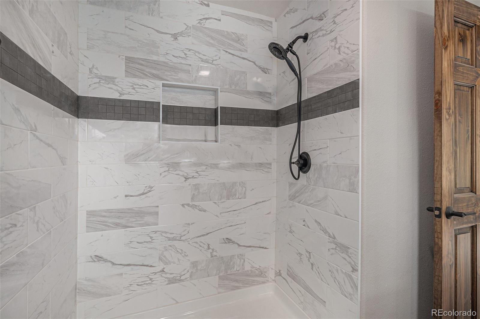 68 Aspen Drive Bailey, CO 80421 - Photo 20 of 35 a bathroom with a shower