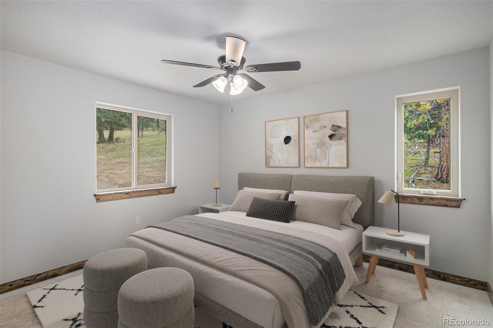 68 Aspen Drive Bailey, CO 80421 - Photo 21 of 35 a bedroom with a bed and a window