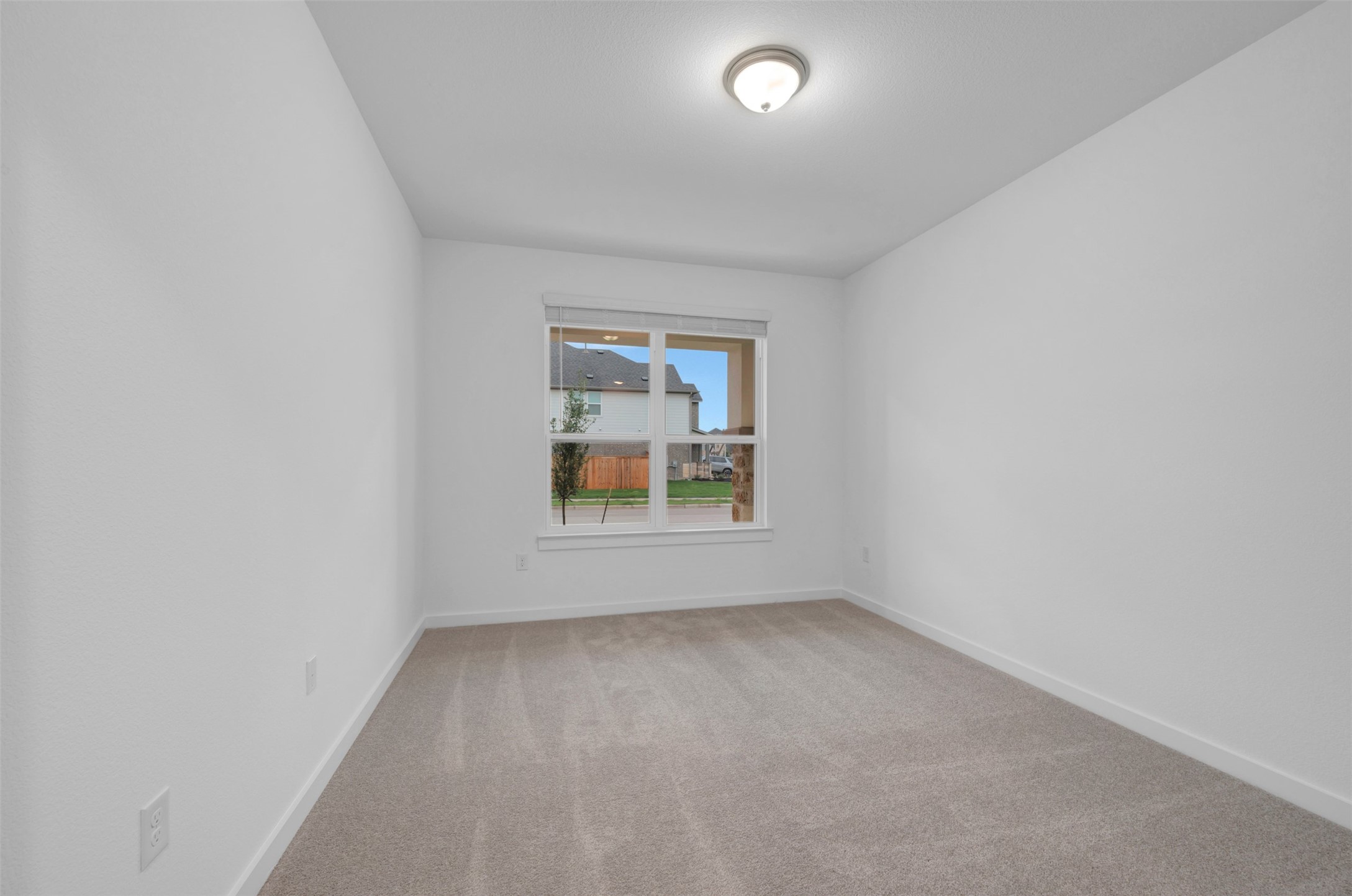 3705 Helena Way Leander, TX 78641 - Photo 12 of 40 an empty room with windows