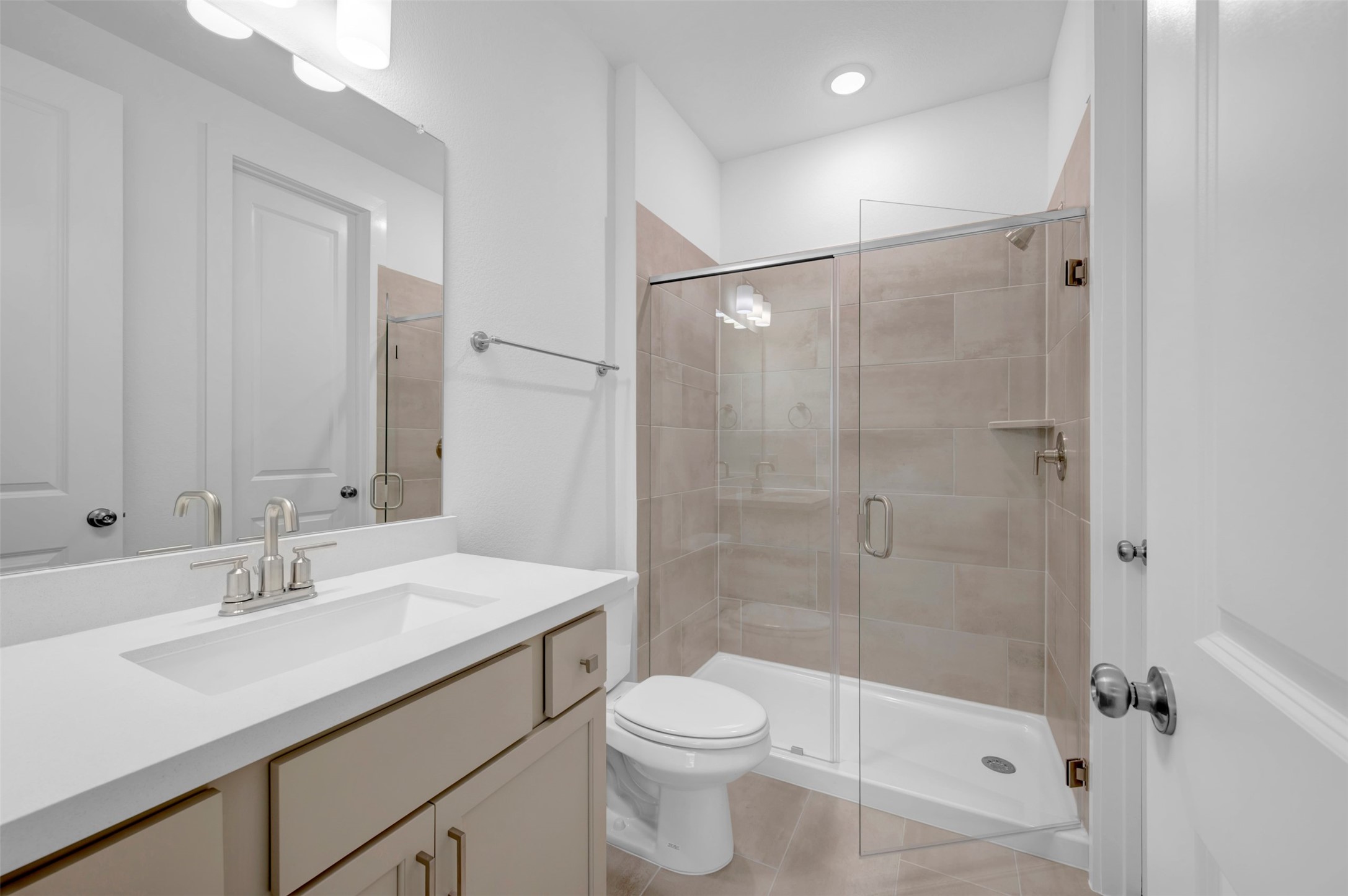 3705 Helena Way Leander, TX 78641 - Photo 14 of 40 a bathroom with a sink toilet and shower