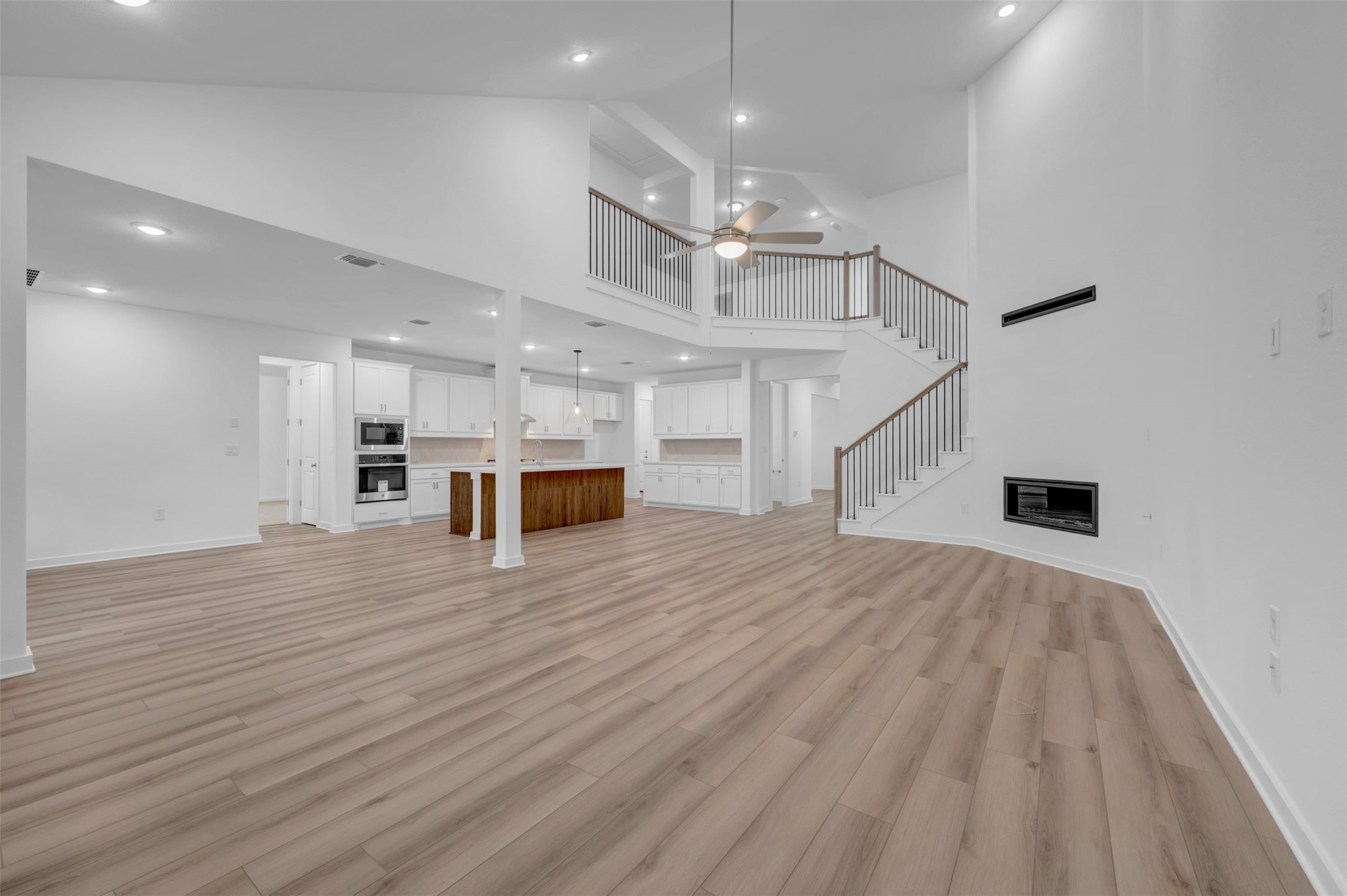 3705 Helena Way Leander, TX 78641 - Photo 15 of 40 a view of kitchen and hall with wooden floor