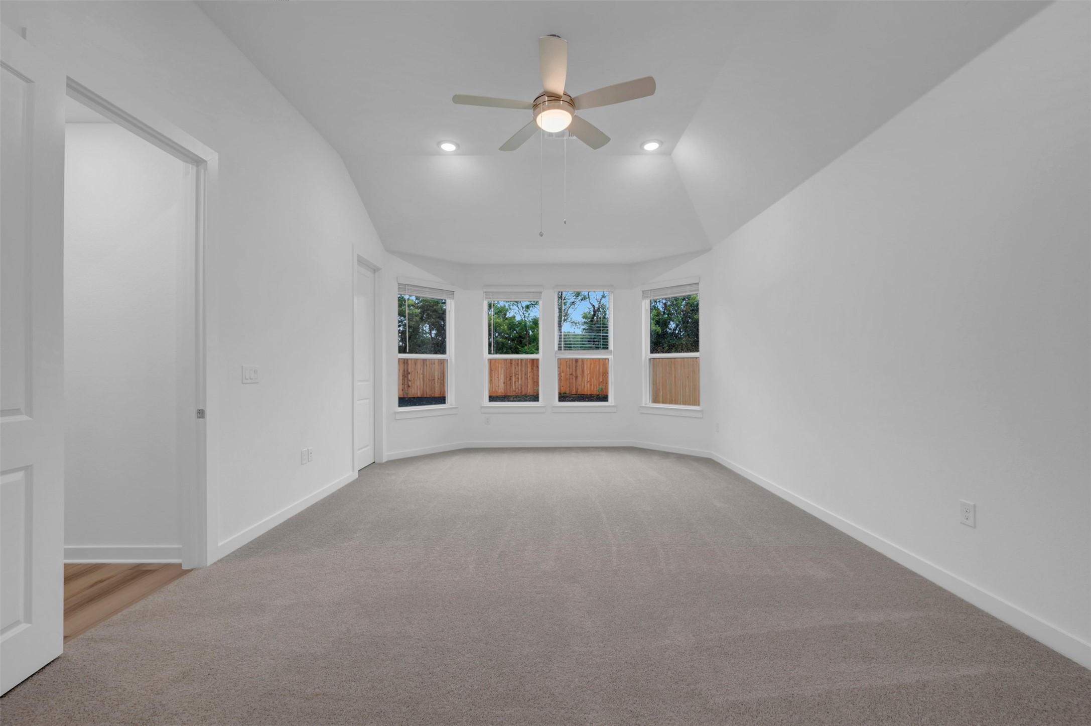 3705 Helena Way Leander, TX 78641 - Photo 19 of 40 an empty room with windows and ceiling fan