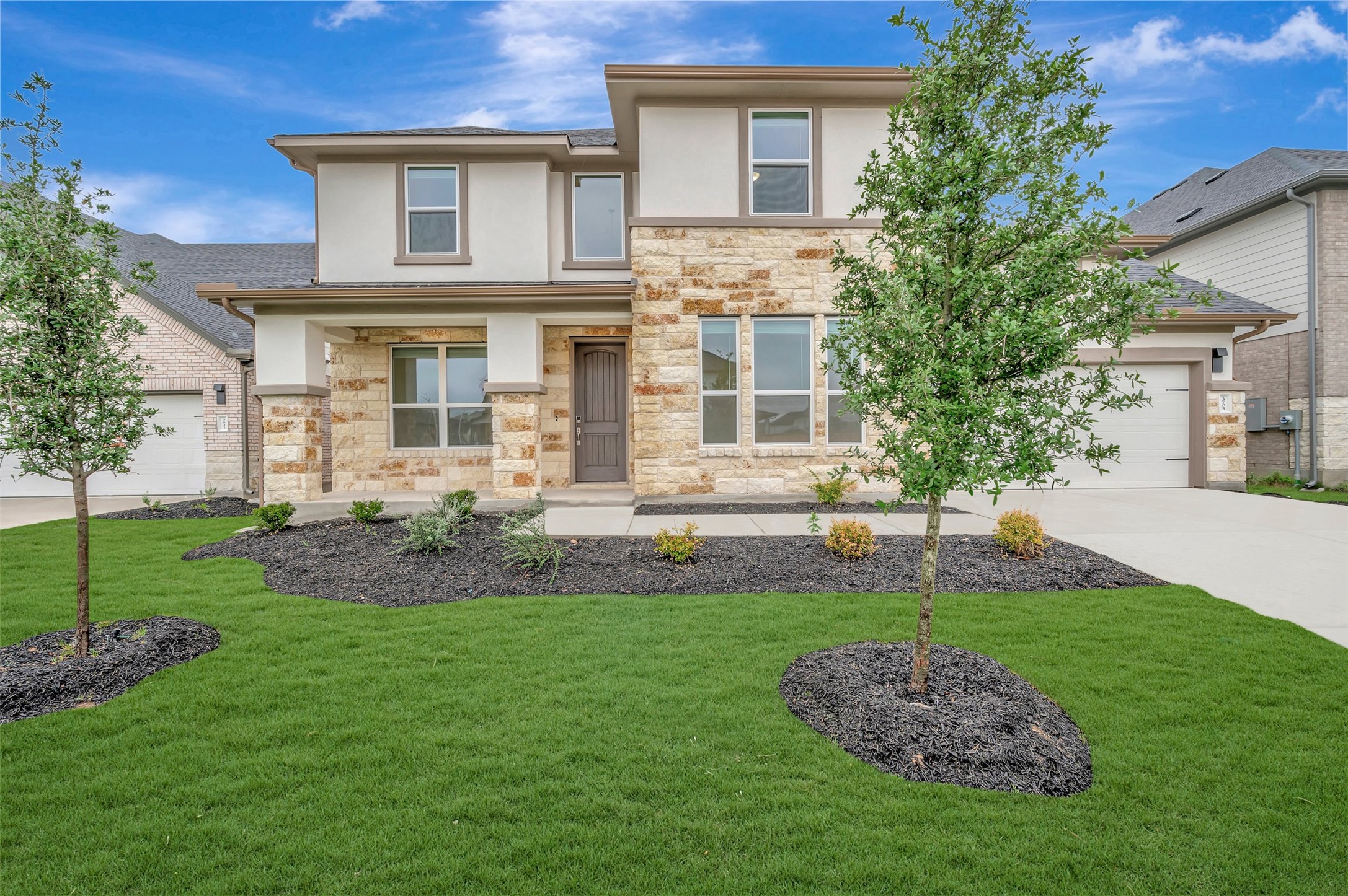 3705 Helena Way Leander, TX 78641 - Photo 2 of 40 a front view of a house with a yard