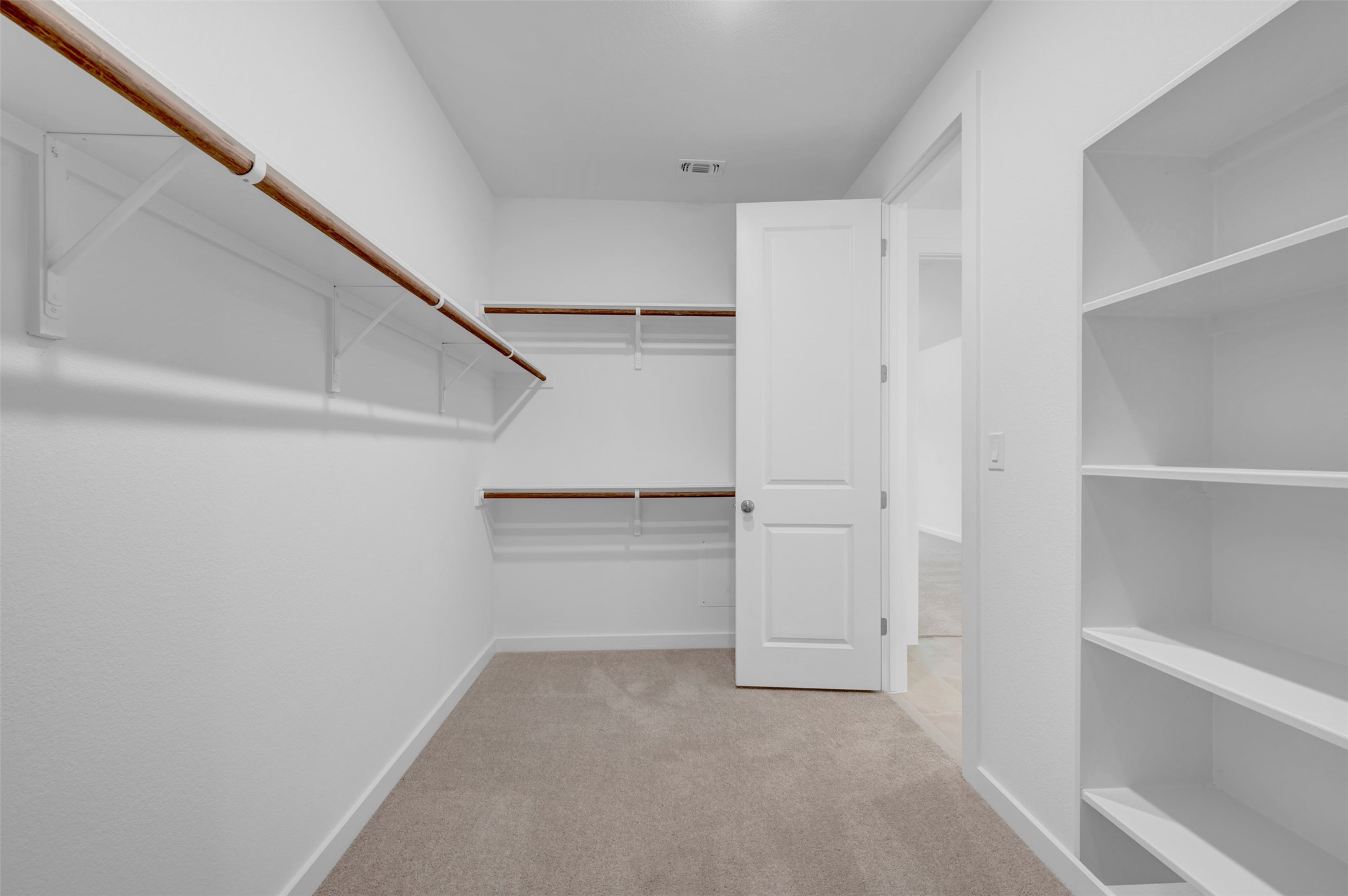 3705 Helena Way Leander, TX 78641 - Photo 24 of 40 a view of an empty walk in closet