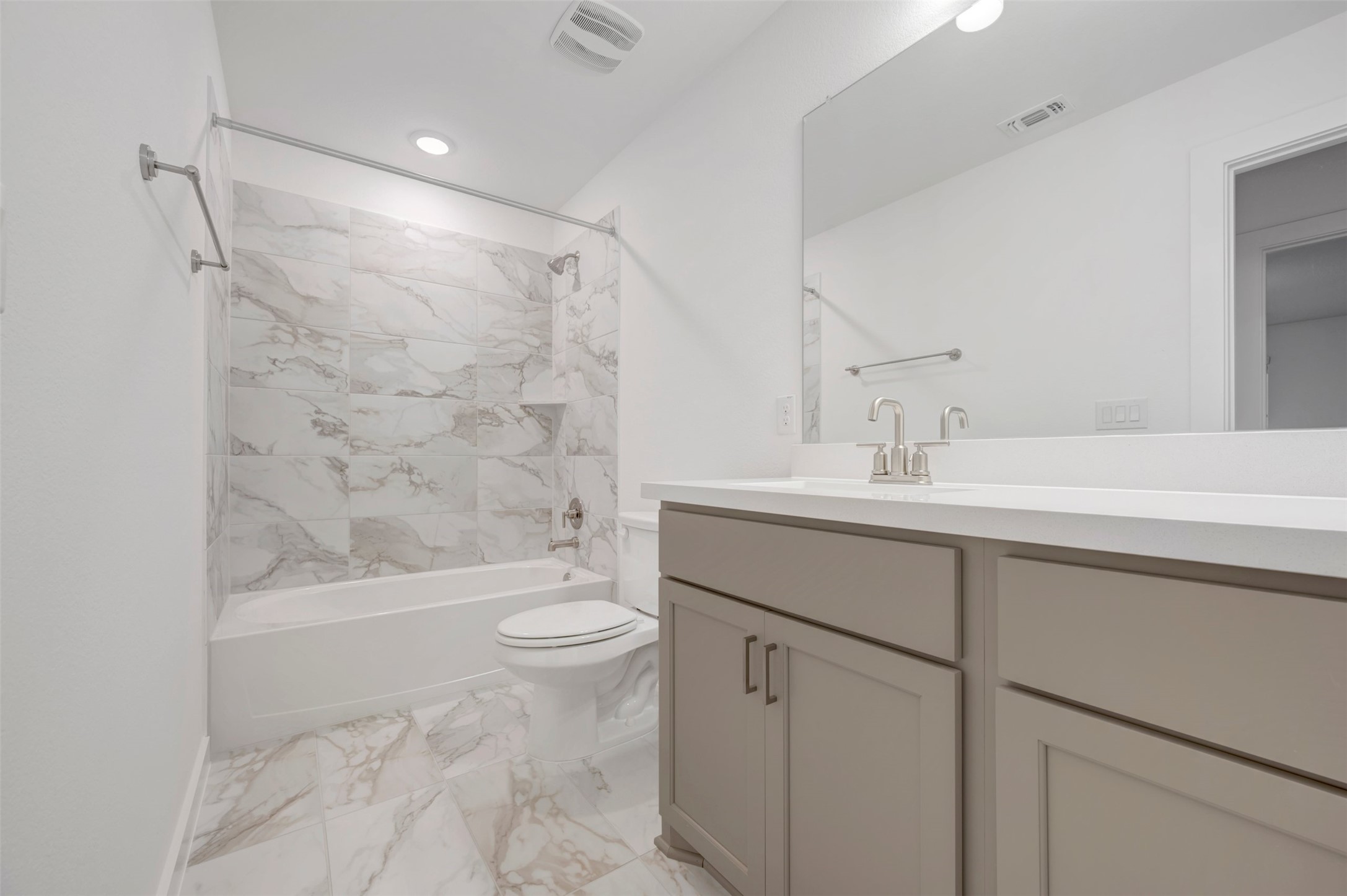 3705 Helena Way Leander, TX 78641 - Photo 28 of 40 a bathroom with a sink toilet and shower