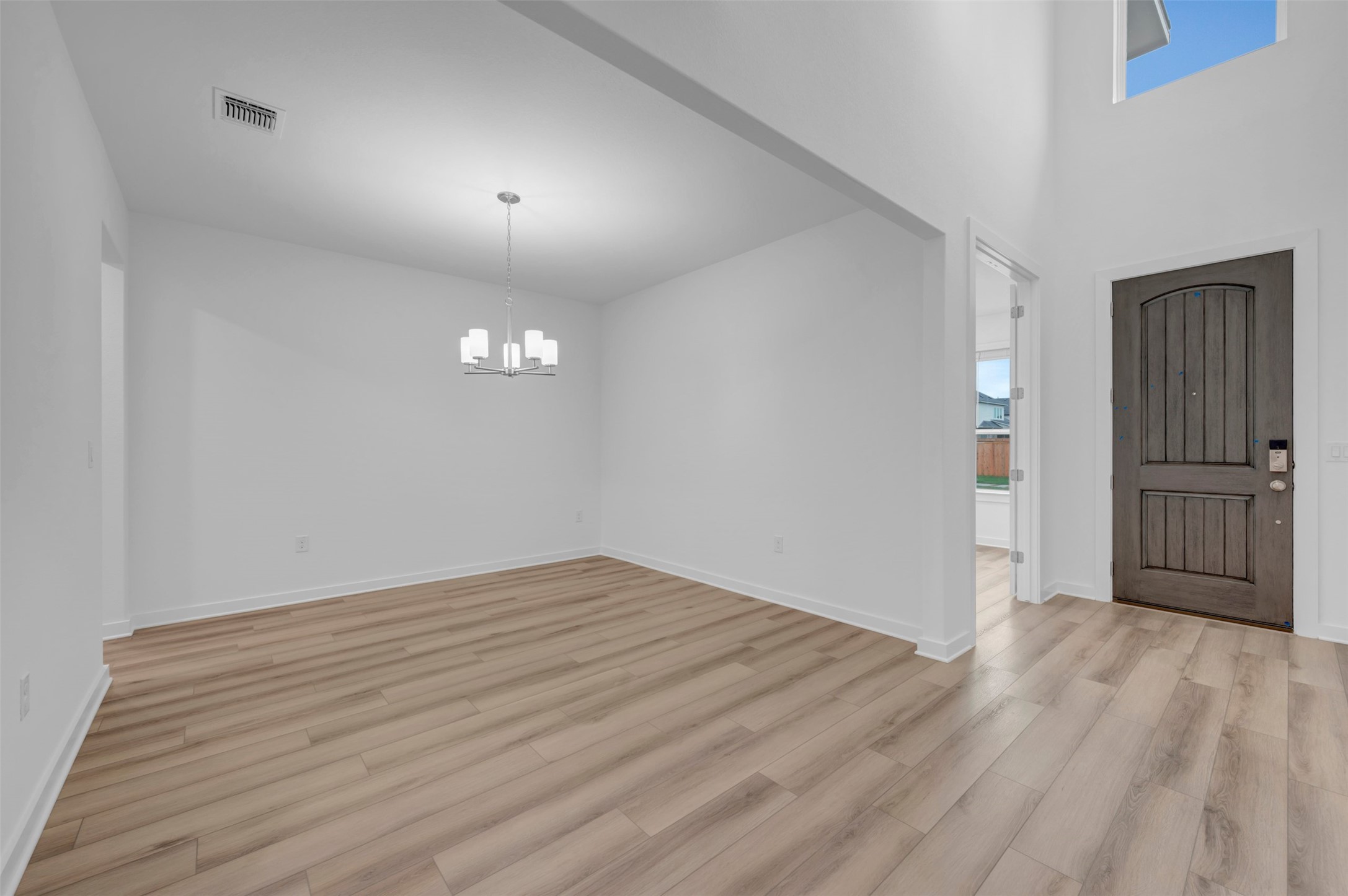 3705 Helena Way Leander, TX 78641 - Photo 3 of 40 a view of empty room with wooden floor