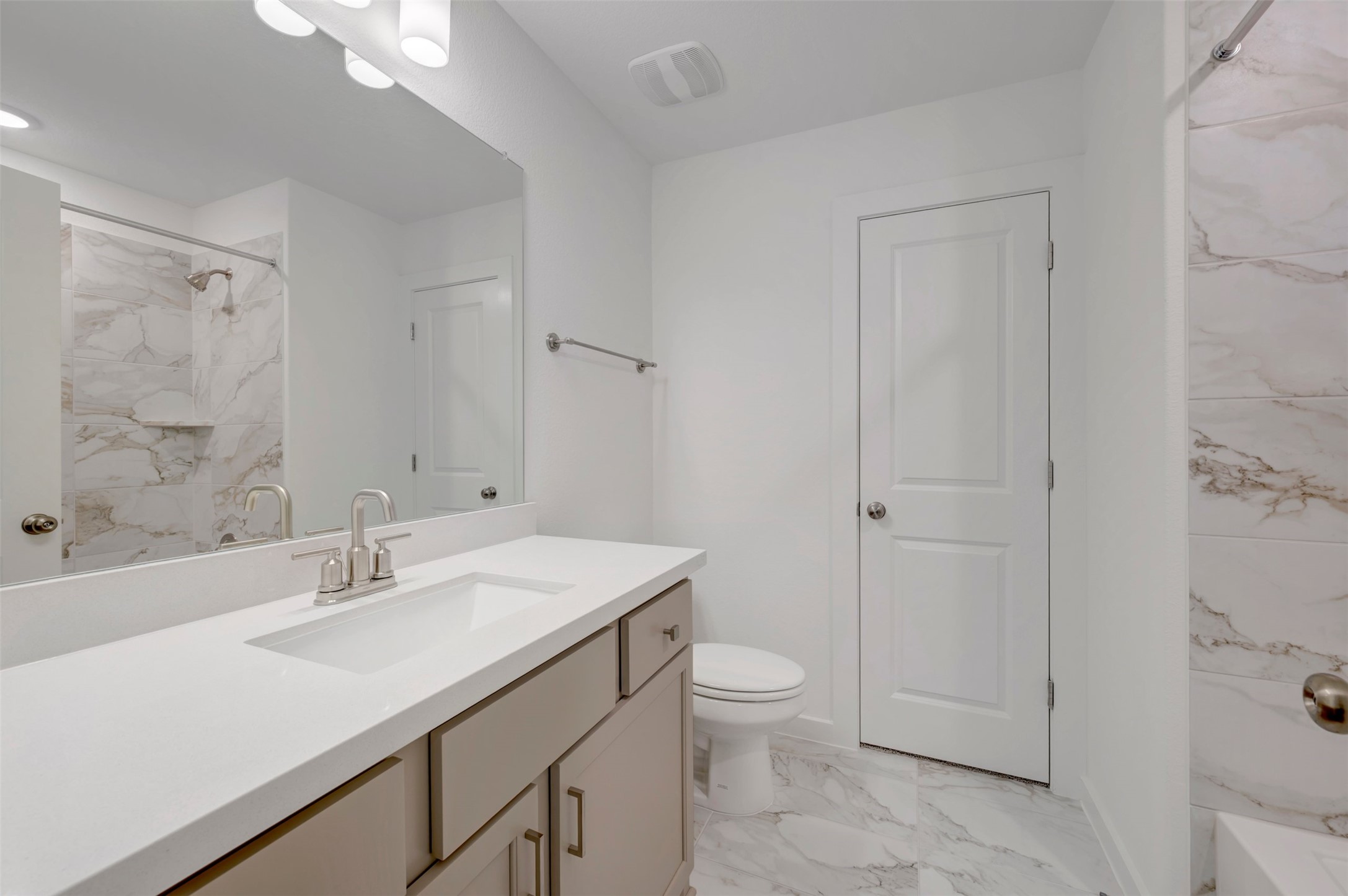 3705 Helena Way Leander, TX 78641 - Photo 36 of 40 a bathroom with a sink toilet and shower