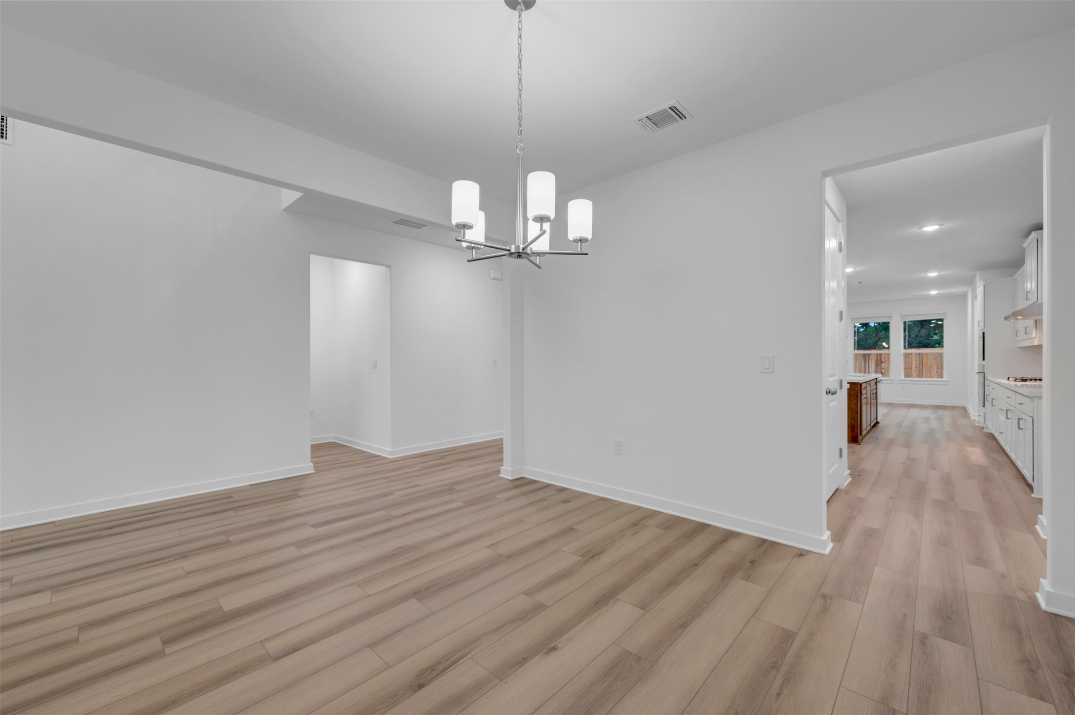 3705 Helena Way Leander, TX 78641 - Photo 7 of 40 a view of a livingroom with wooden floor