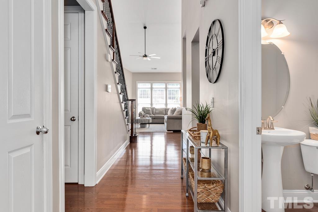 1136 Chapanoke Road Raleigh, NC 27603 - Photo 20 of 48 a view of entryway and hall with wooden floor