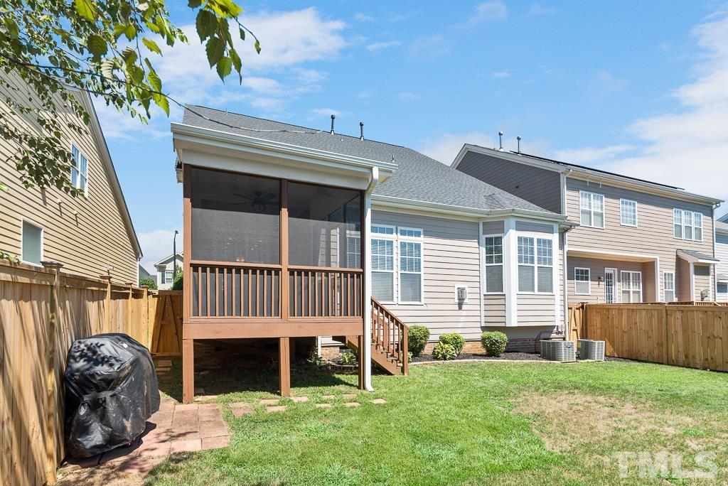 1136 Chapanoke Road Raleigh, NC 27603 - Photo 36 of 48 a front view of a house with a garden