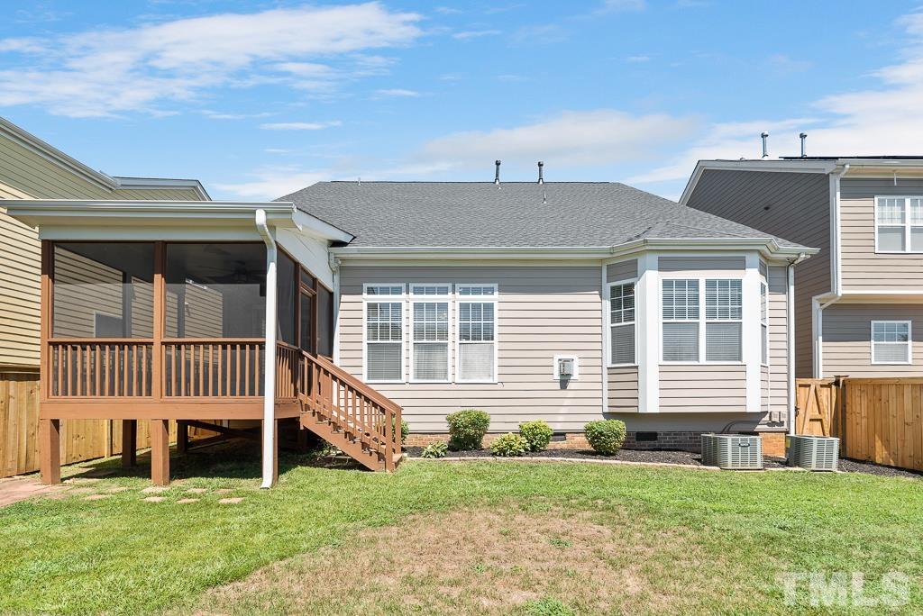 1136 Chapanoke Road Raleigh, NC 27603 - Photo 37 of 48 a front view of a house with a garden