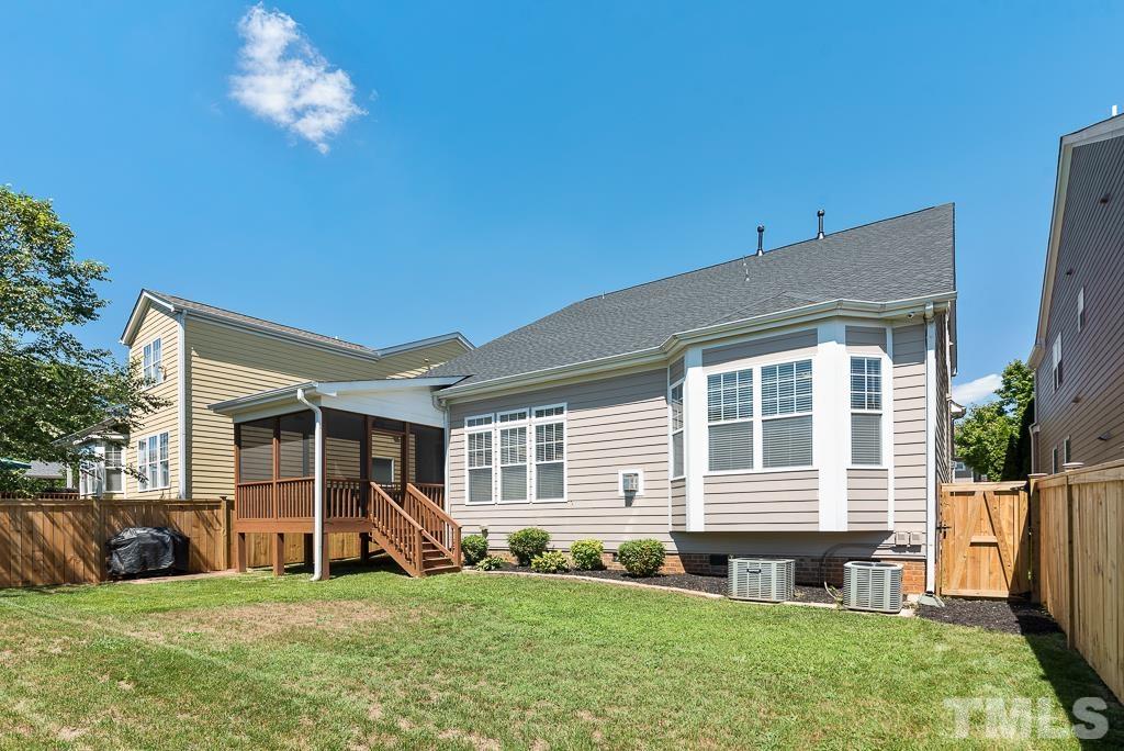 1136 Chapanoke Road Raleigh, NC 27603 - Photo 38 of 48 a view of a house with a yard