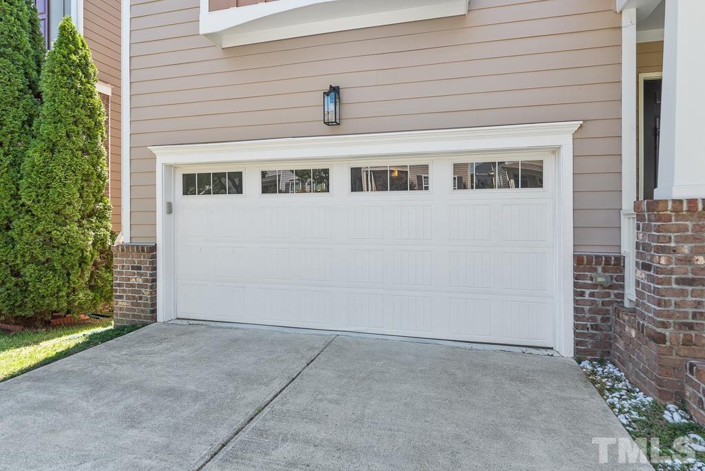 1136 Chapanoke Road Raleigh, NC 27603 - Photo 4 of 48 a front view of a house with a yard