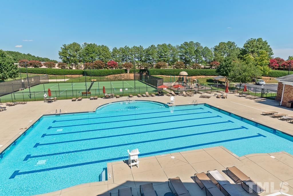 1136 Chapanoke Road Raleigh, NC 27603 - Photo 48 of 48 a view of a patio with chairs and potted plants
