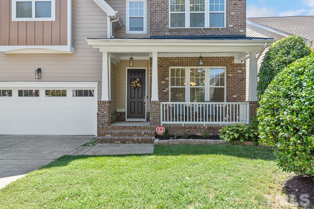 1136 Chapanoke Road Raleigh, NC 27603 - Photo 5 of 48 a front view of a house with garage