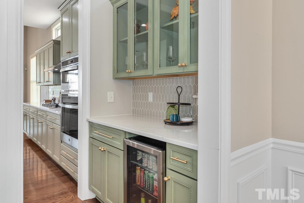 1136 Chapanoke Road Raleigh, NC 27603 - Photo 10 of 48 a kitchen with stainless steel appliances granite countertop a sink and cabinets