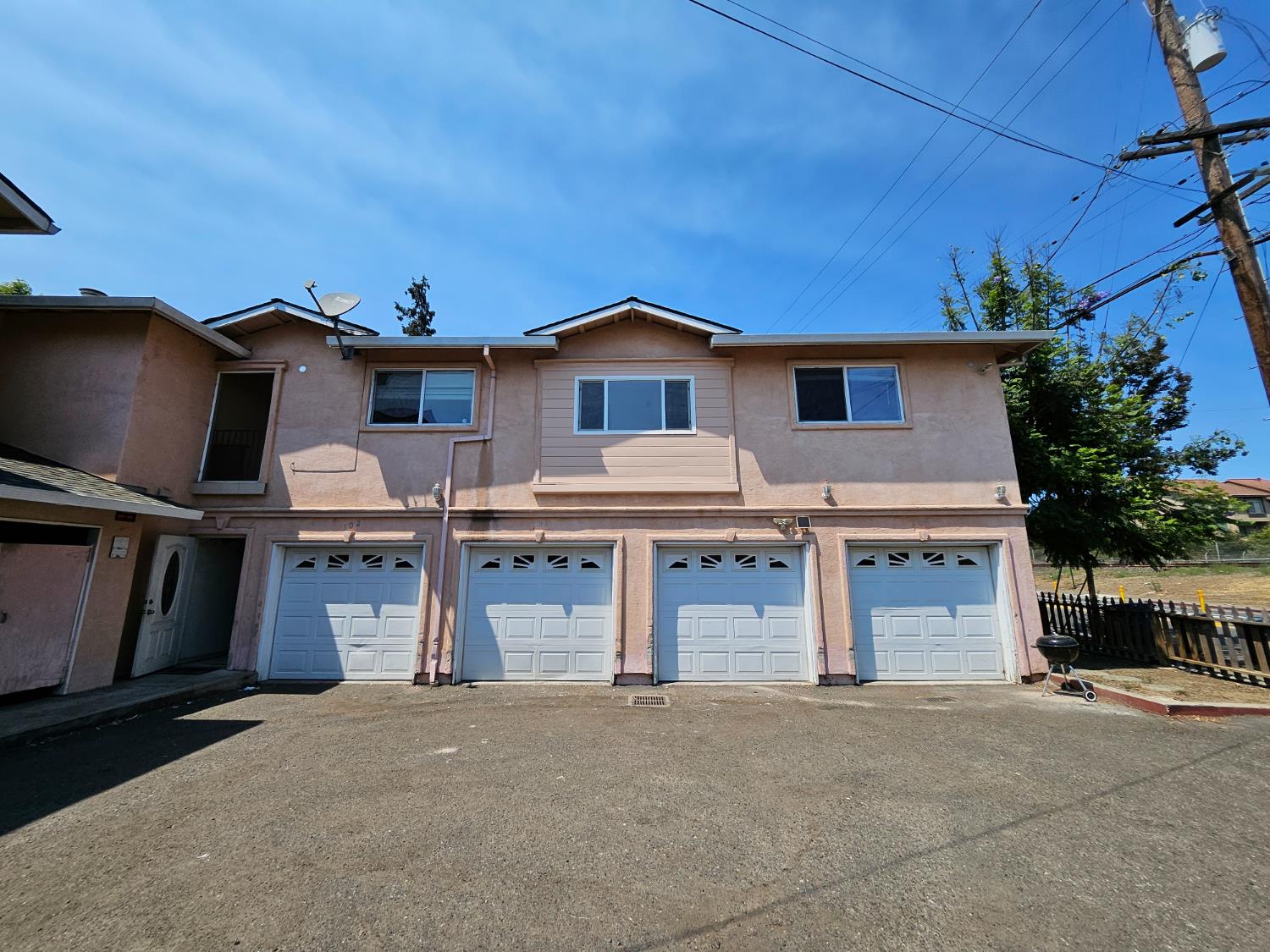 25231 Whitman Street, Unit 103 Hayward, CA 94544 - Photo 1 of 30 a front view of a house with garage