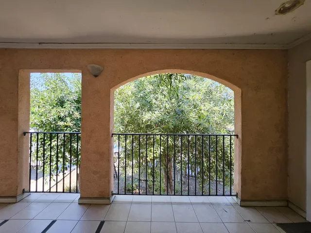 a view of a balcony with an outdoor space