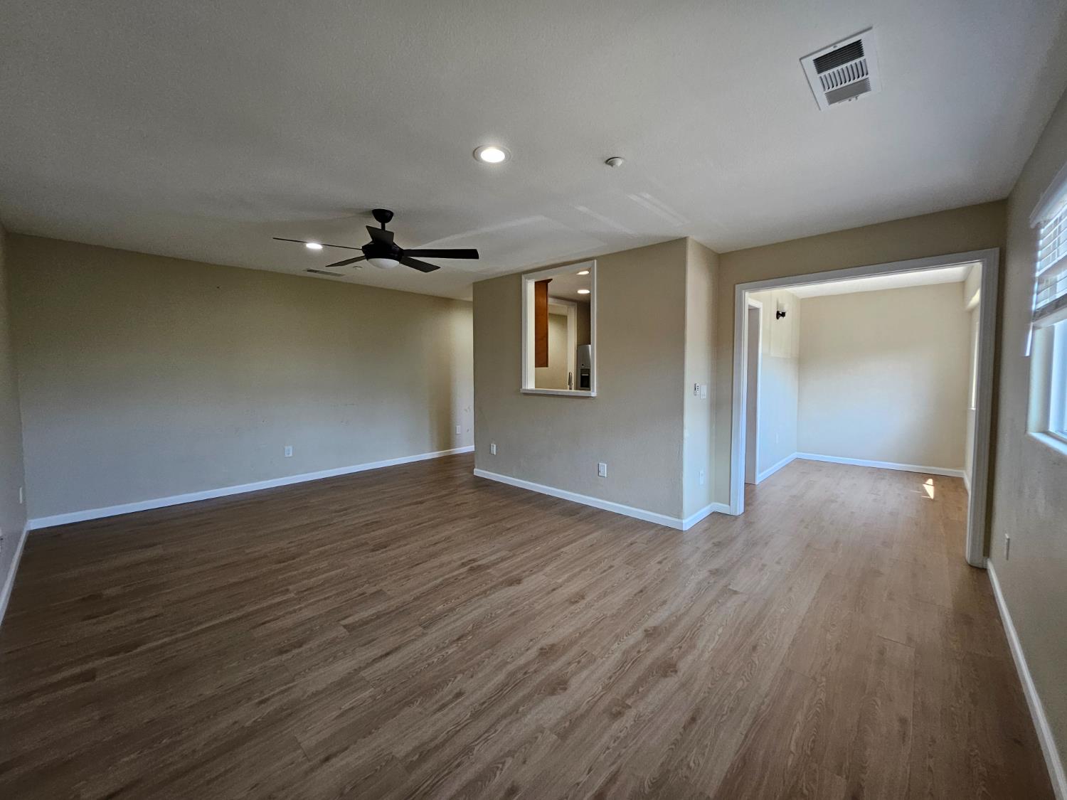 25231 Whitman Street, Unit 103 Hayward, CA 94544 - Photo 12 of 30 a view of a livingroom with wooden floor