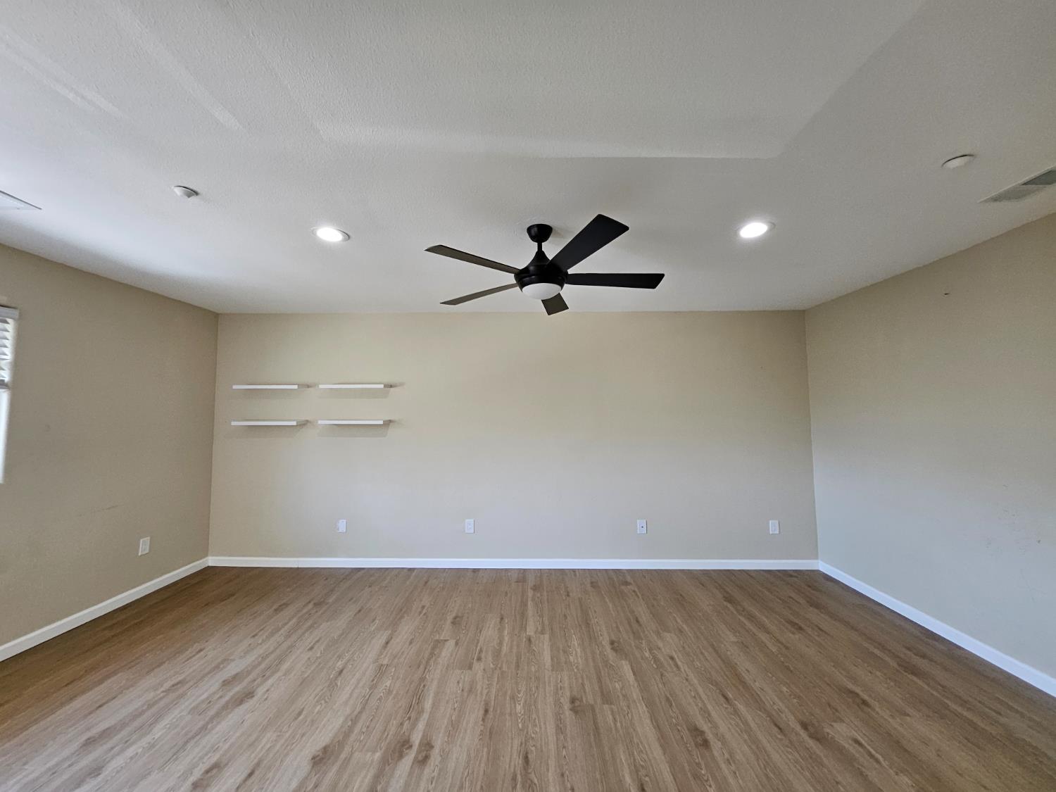 25231 Whitman Street, Unit 103 Hayward, CA 94544 - Photo 15 of 30 wooden floor in an empty room with a window