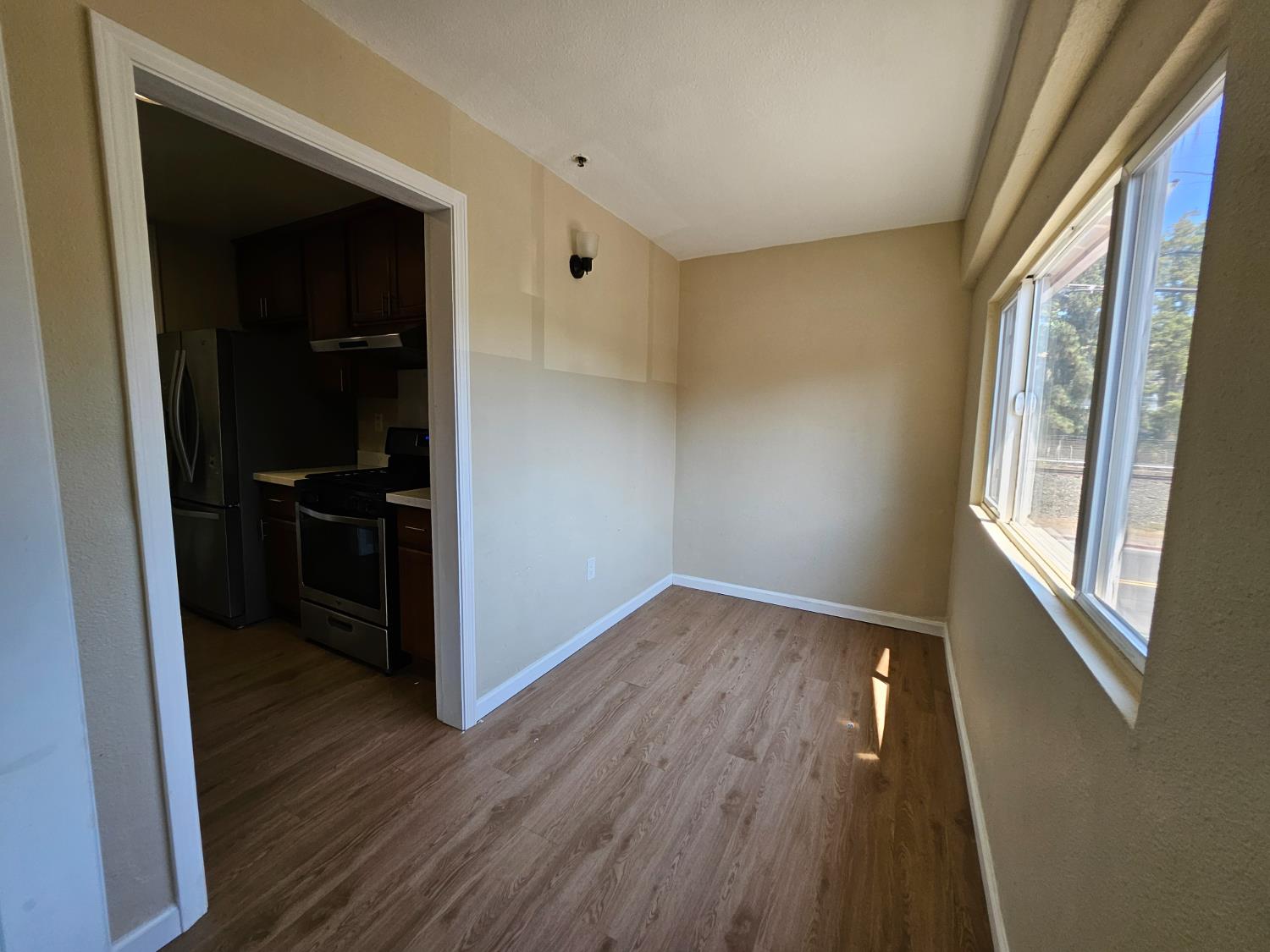 25231 Whitman Street, Unit 103 Hayward, CA 94544 - Photo 18 of 30 a view of hallway with wooden floor and cabinets