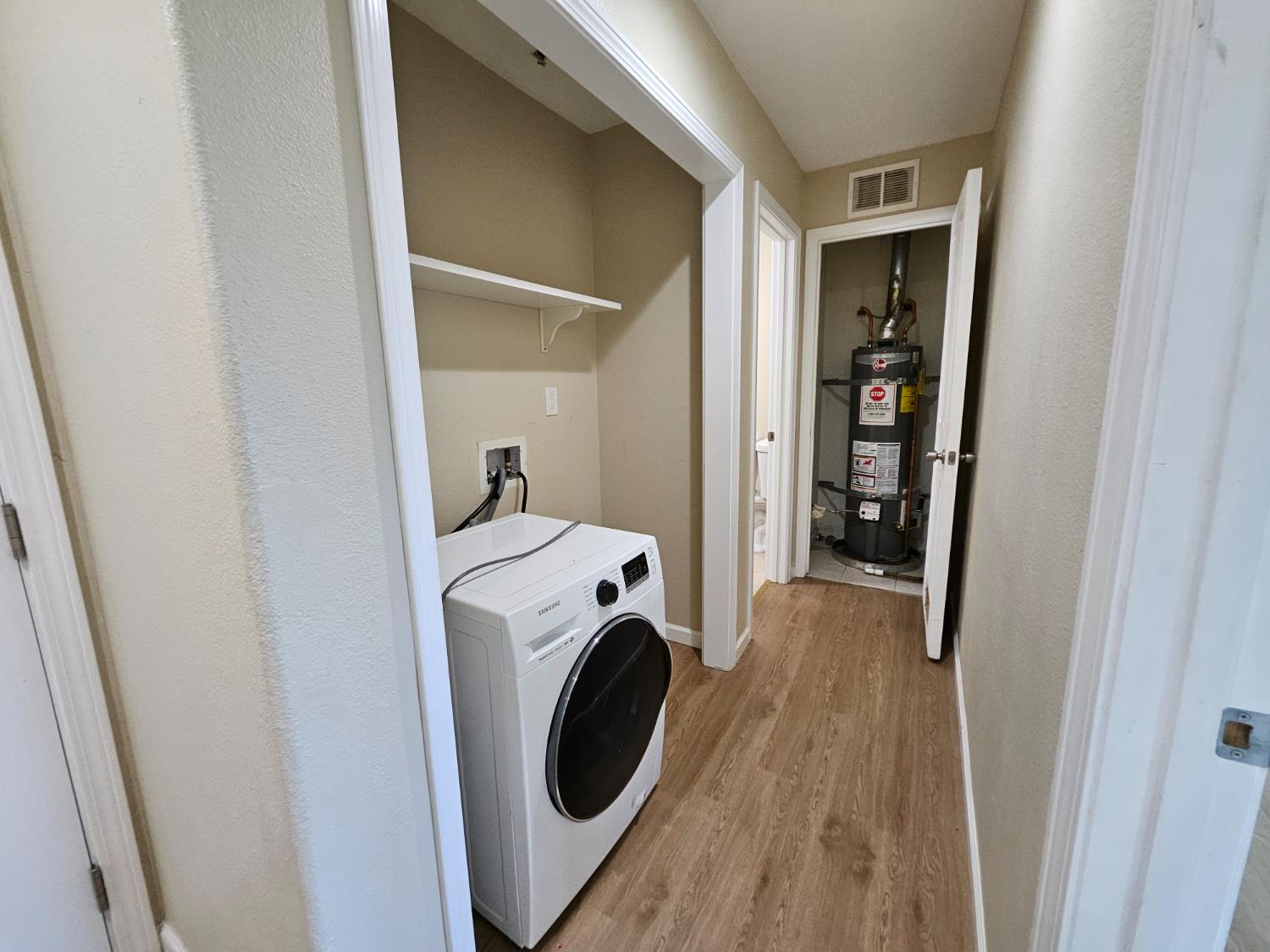 25231 Whitman Street, Unit 103 Hayward, CA 94544 - Photo 28 of 30 a view of hallway with washer and dryer