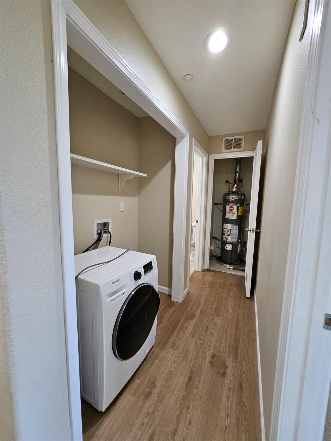 25231 Whitman Street, Unit 103 Hayward, CA 94544 - Photo 29 of 30 a view of utility room with washer and dryer
