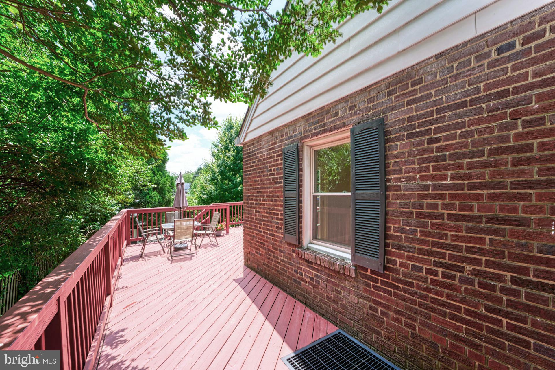 9925 Markham Street Silver Spring, MD 20901 - Photo 33 of 41 Wrap around Deck to Screened in Porch