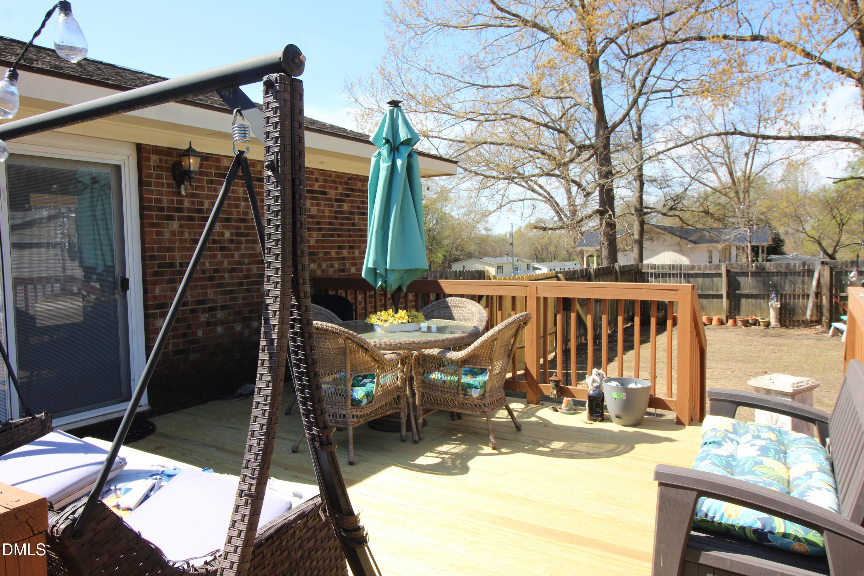 56 Ash Street Coats, NC 27521 - Photo 10 of 28 a view of a patio with iron fence
