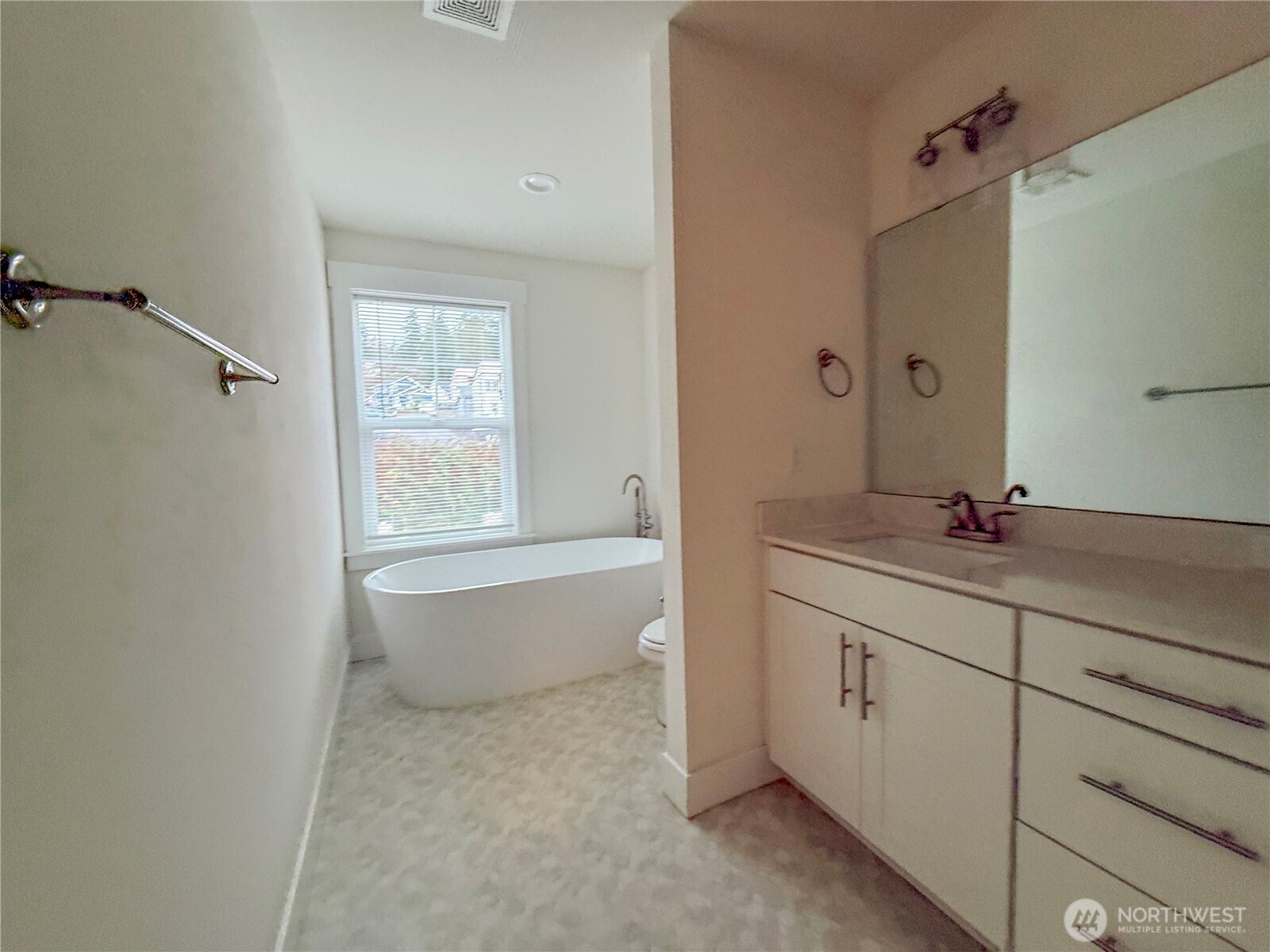 30 East Compass Lane, Unit A98524 Allyn, WA 98524 - Photo 14 of 36 a bathroom with a granite countertop sink mirror and bathtub