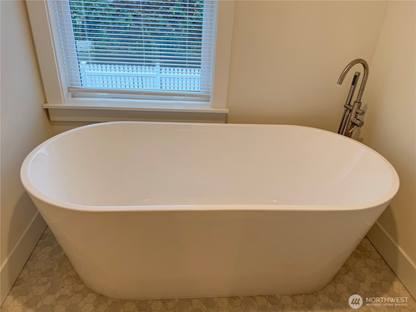 30 East Compass Lane, Unit A98524 Allyn, WA 98524 - Photo 16 of 36 a white tub sitting in a bathroom