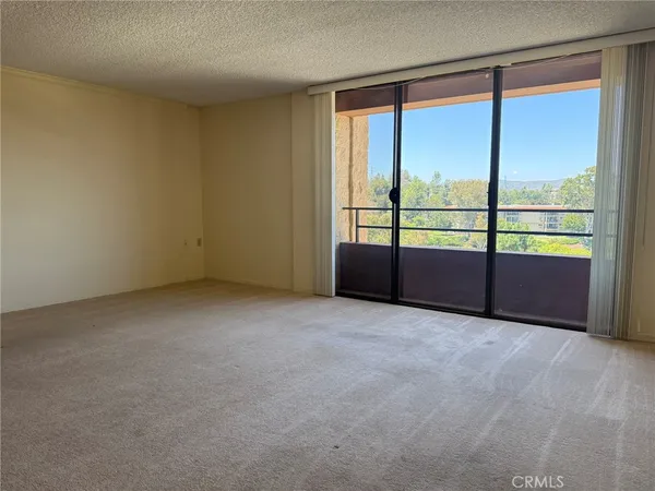 an empty room with natural light