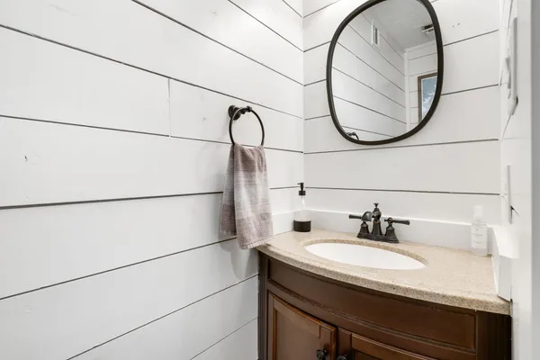 a bathroom with a toilet and shower