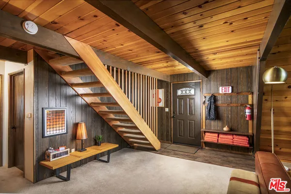 a view of a hallway with staircase