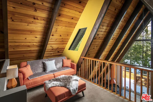 a view of balcony with furniture