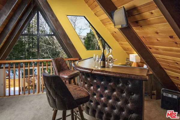 a bedroom with bed and window