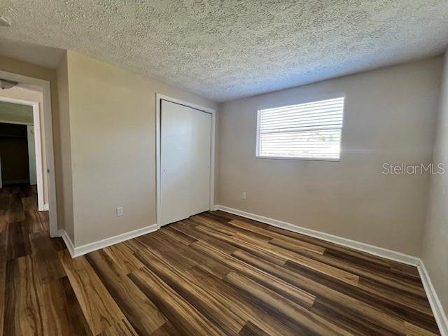 6413 Sutters Mill Road New Port Richey, FL 34653 - Photo 15 of 20 a view of a room with wooden floor