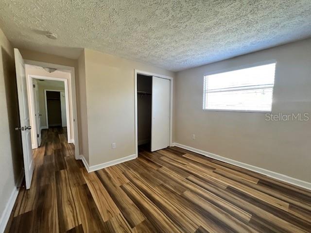 6413 Sutters Mill Road New Port Richey, FL 34653 - Photo 16 of 20 a view of a room with wooden floor