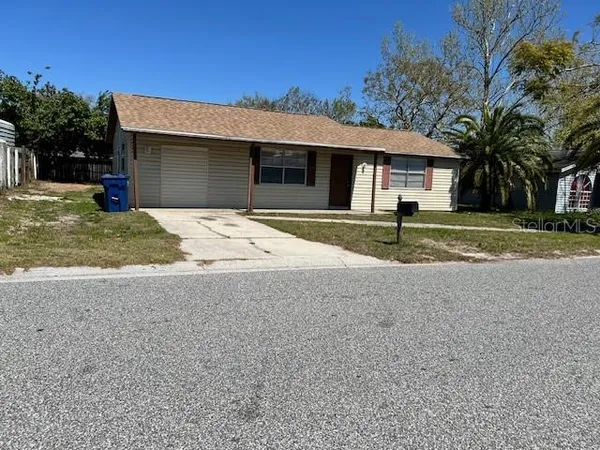 a house with trees in front of it