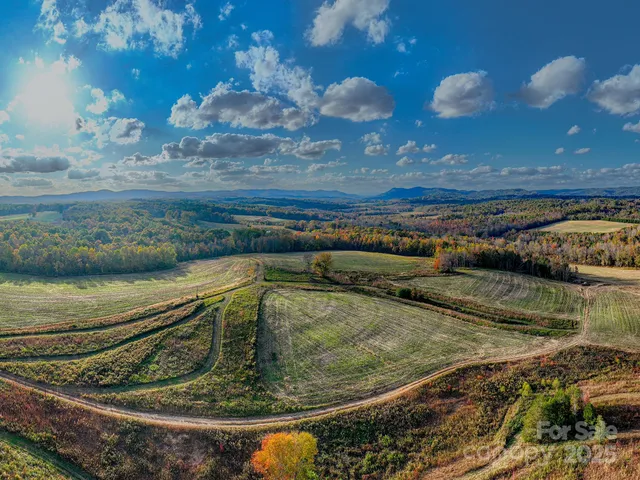 a view of a lake with a yard