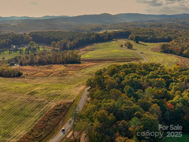 a view of a large building with a yard