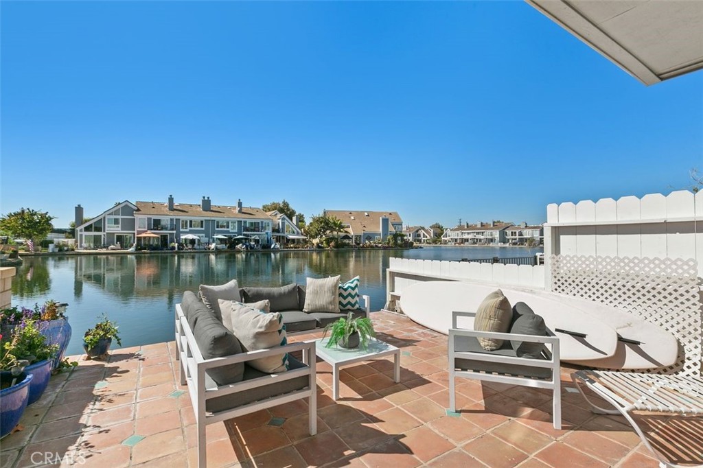 16117 St Croix Circle Huntington Beach, CA 92649 - Photo 11 of 45 a view of a lake with couches