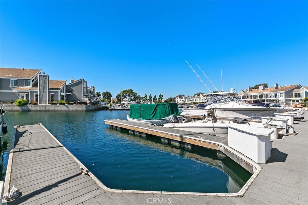 16117 St Croix Circle Huntington Beach, CA 92649 - Photo 34 of 45 a view of a lake with a terrace