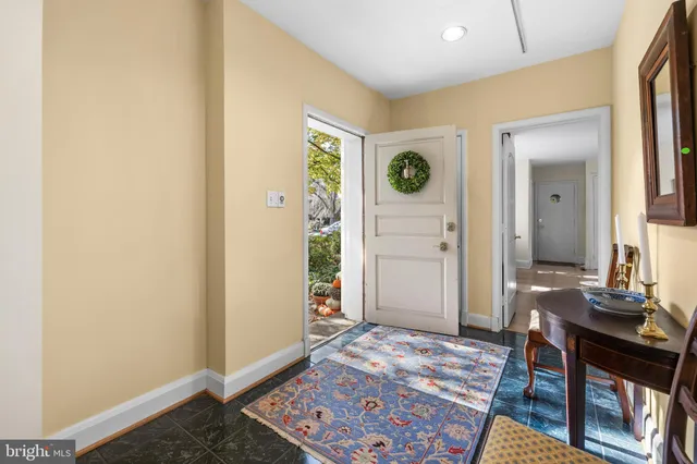 a view of a workspace room with wooden floor
