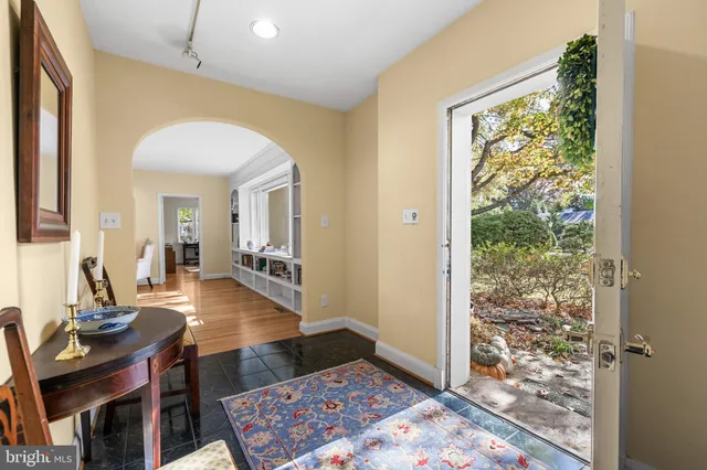 a living room with a couch and a table
