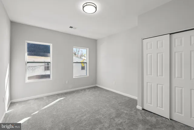 an empty room with windows