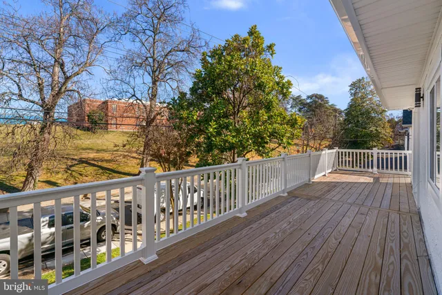a view of a brick house with a outdoor space